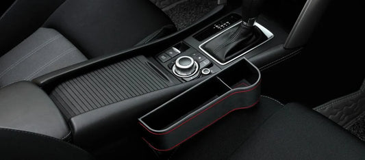 Premium multifunctional car seat organiser with various compartments for storing phones, chargers, pens, and other car essentials