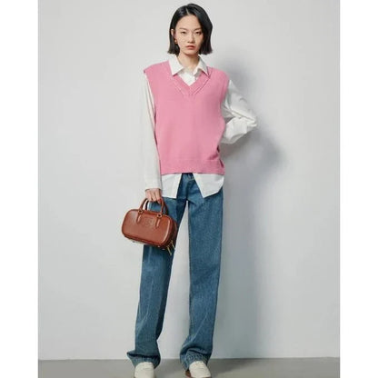 Elegant sleeveless v-neck knit vest in rose red and black colours, with a stylish split back design for a flattering silhouette