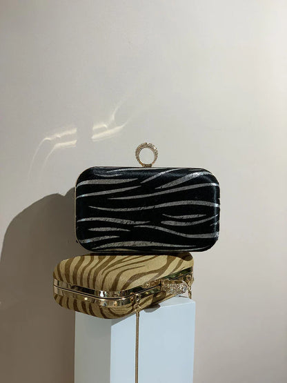 A premium handcrafted messenger bag made with luxurious horsehair and featuring a unique colourful brick ring buckle closure, showcasing the timeless charm of British craftsmanship.