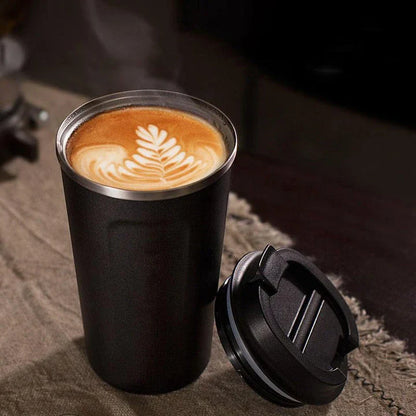 Stylish and durable stainless steel thermos mug with double-wall vacuum insulation, keeping drinks hot or cold for hours on end.