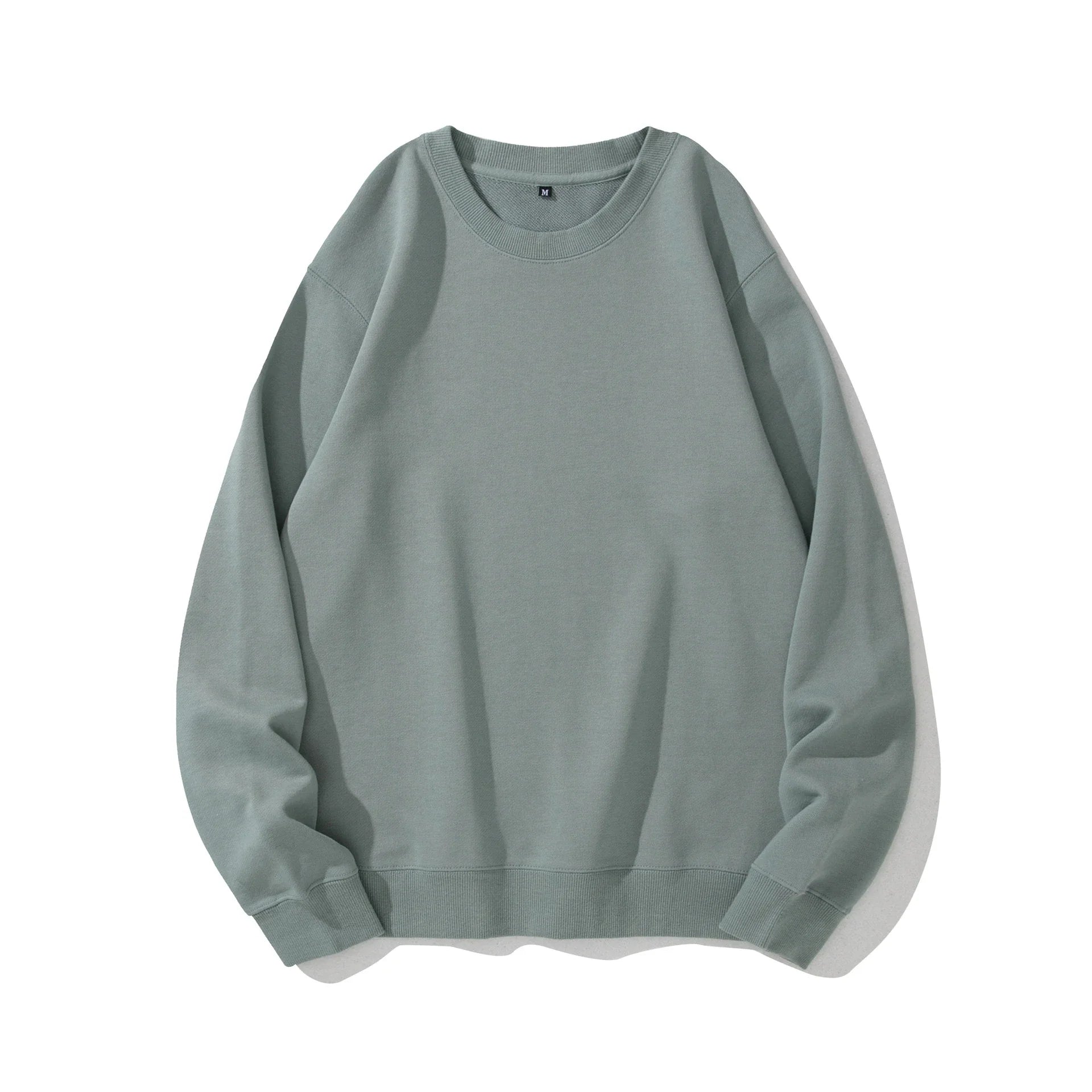 Premium heavyweight knitted jumper in a range of solid colours, made with soft cotton terry fabric for cosy comfort.