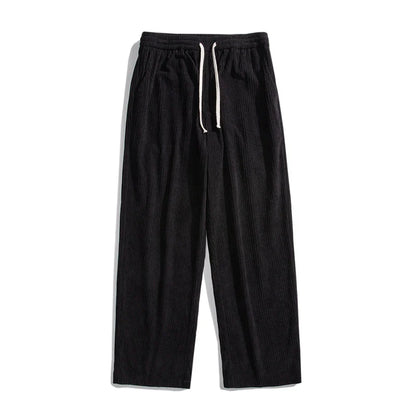 Premium fleece-lined corduroy trousers in a range of versatile colours, featuring a relaxed, straight-leg silhouette for a sophisticated, comfortable look.