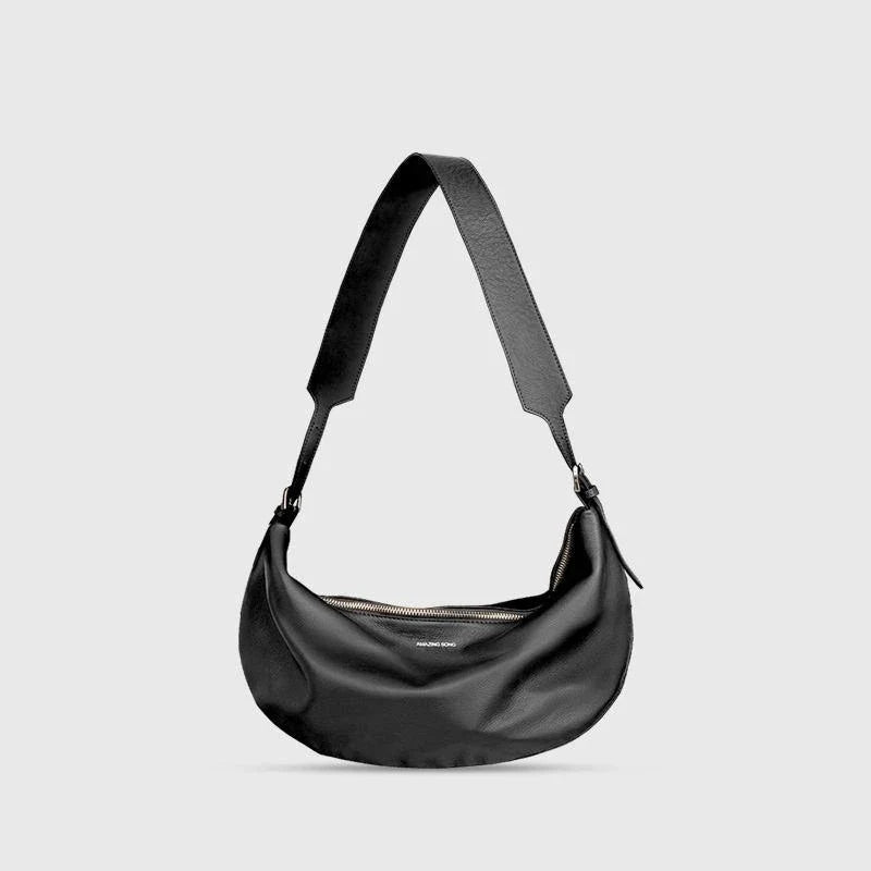 Stylish leather crossbody fanny pack with vintage half-moon design, perfect for everyday use in the UK