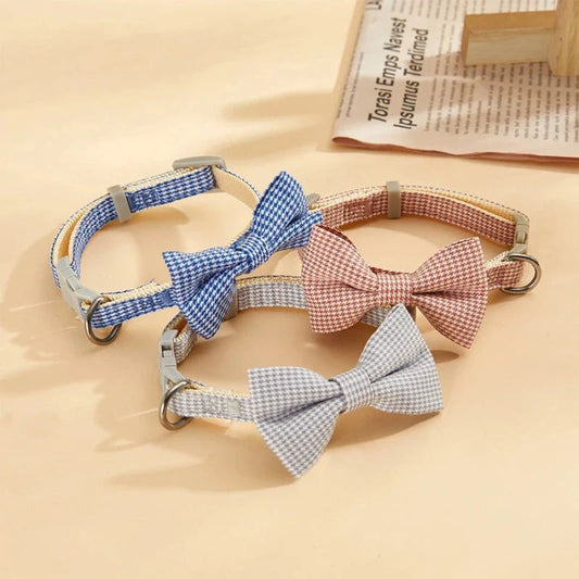 Stylish checkered pet collar with elegant butterfly knot decoration, perfect for dressing up cats and dogs