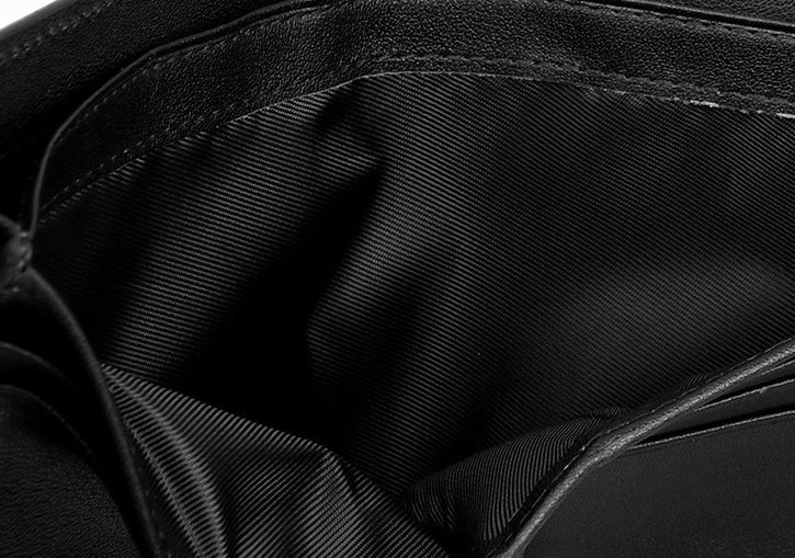 Sophisticated men's leather wallet in black, made from premium crocodile skin for a refined and durable everyday accessory
