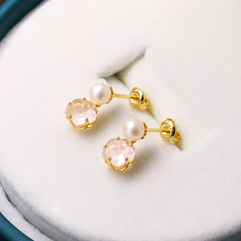 Hypoallergenic silver earrings with delicate cherry blossom crystal accents, perfect for sensitive skin