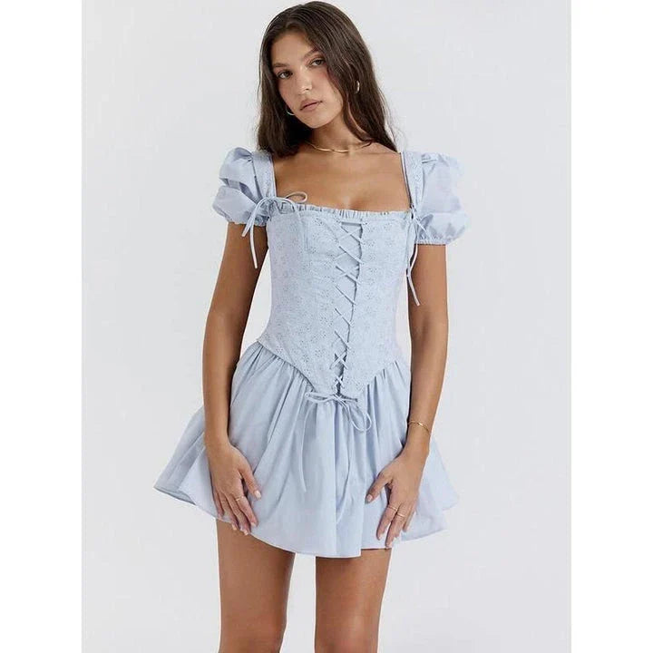 Elegant puff sleeve mini dress with square collar, backless design, and A-line silhouette for modern British women