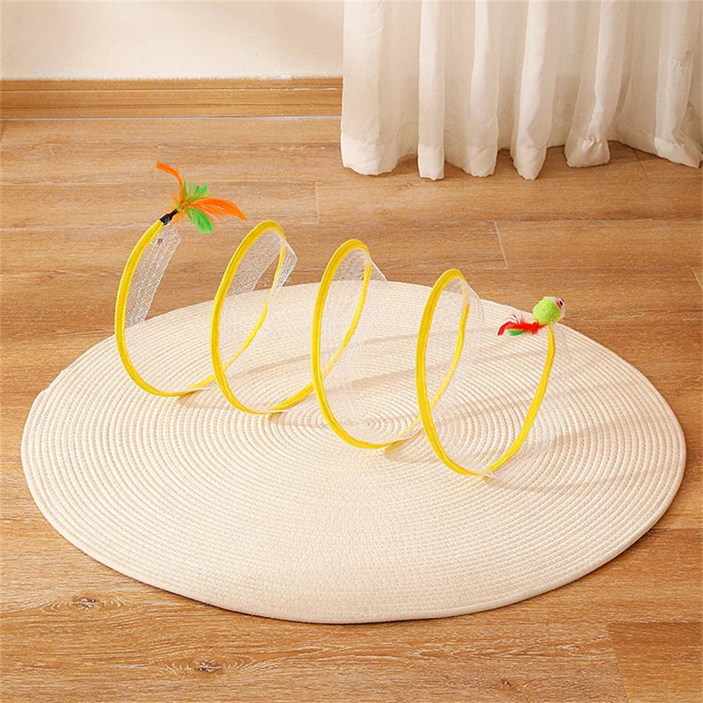 Folding cat play tunnel with various toys like balls, feathers, and mice attached to the sides