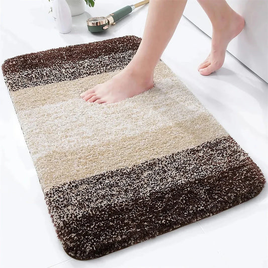 Luxurious microfibre absorbent bath mat with soft, plush texture and non-slip rubber backing for comfort and safety in the bathroom