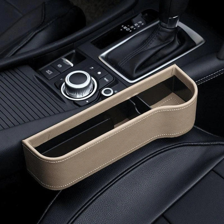 Premium multifunctional car seat organiser with various compartments for storing phones, chargers, pens, and other car essentials