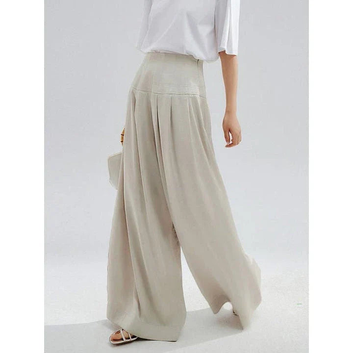 Elegant high-waisted wide-leg trousers for stylish women, featuring a unique patchwork design and premium cotton-polyester blend fabric