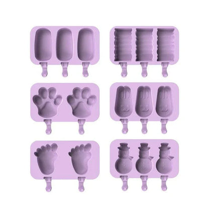 Purple silicone popsicle mould with stainless steel sticks, perfect for creating homemade frozen treats with a British flair