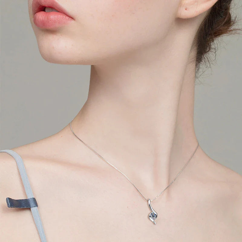 Elegant sterling silver diamond-inspired necklace with a sleek, geometric design