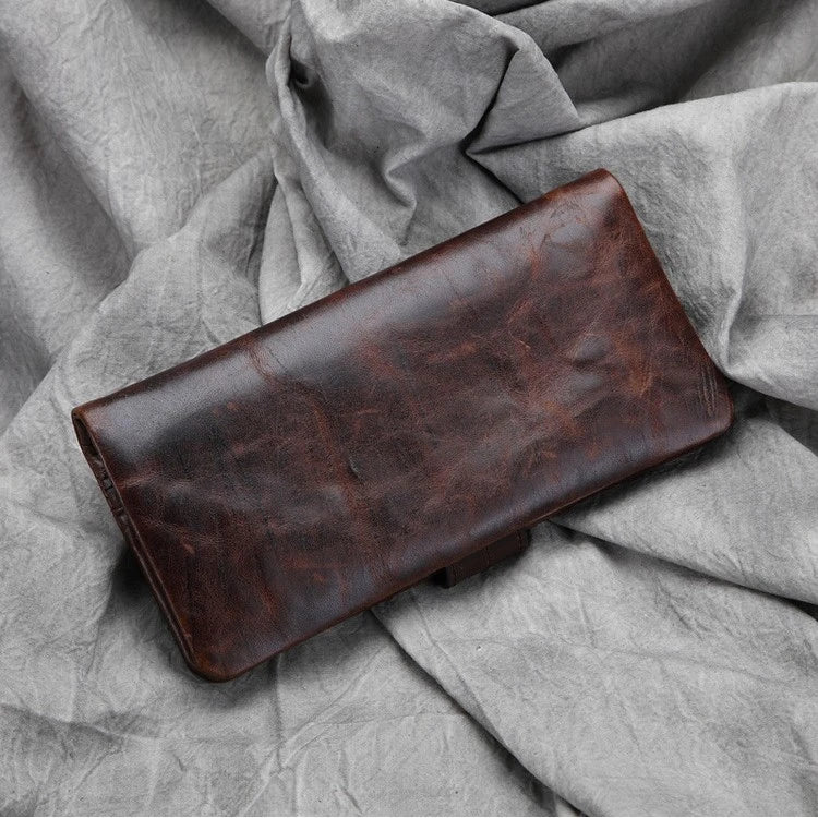 Premium leather wallet with concealed cash compartment, multiple internal slots, and minimalist urban design