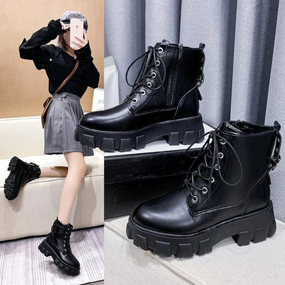 Stylish women's leather boots with a handsome locomotive design, durable rubber soles, and a comfortable round toe for autumn and winter wear.
