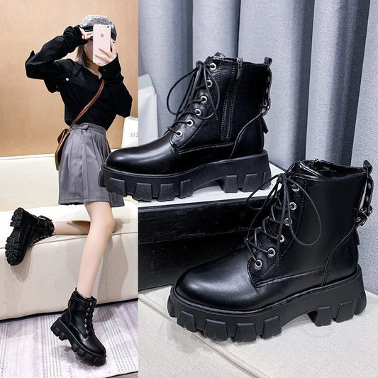 Stylish women's leather boots with a handsome locomotive design, durable rubber soles, and a comfortable round toe for autumn and winter wear.