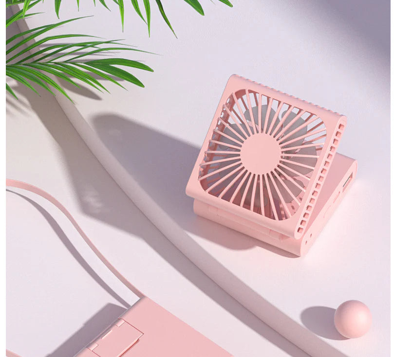 Compact portable USB power bank with built-in cooling fan, perfect for on-the-go use by British consumers