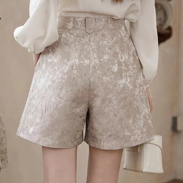 Elegant high-waisted floral jacquard A-line shorts with chic metal buttons, perfect for any occasion