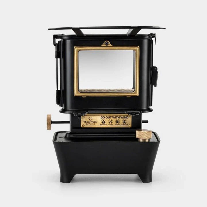 Retro Oil Lamp Stove with brass and stainless steel construction, providing warm light and ambience for outdoor activities in the UK