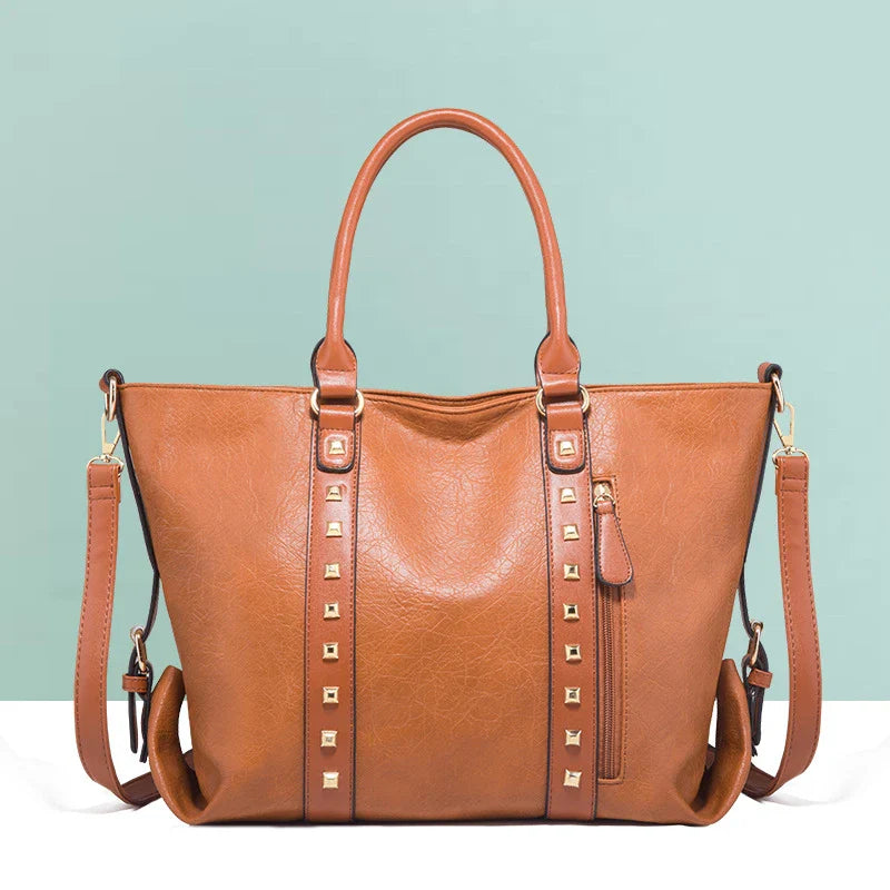 Premium leather shoulder bag in various colours, featuring a spacious yet sleek design for the modern British woman
