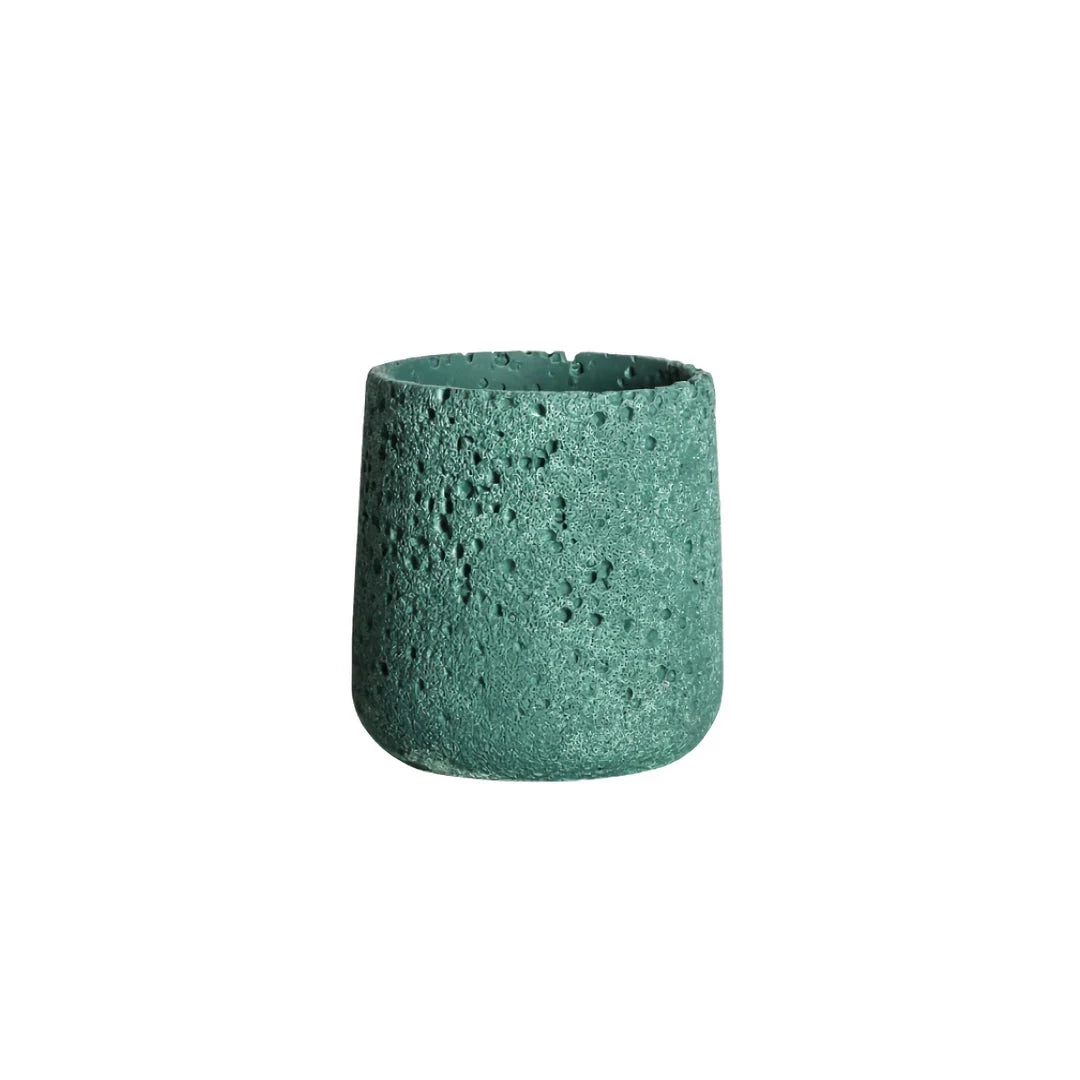 A modern, perforated cement bonsai planter in a Nordic-inspired design, available in various sizes and colours.