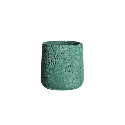 A modern, perforated cement bonsai planter in a Nordic-inspired design, available in various sizes and colours.