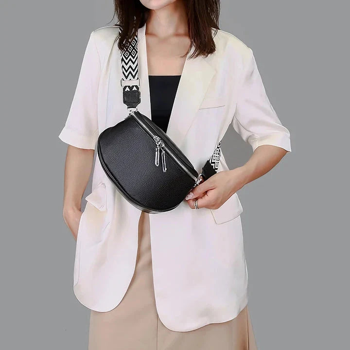 Premium genuine leather tote bag with adjustable strap and interior compartments for fashion-forward women