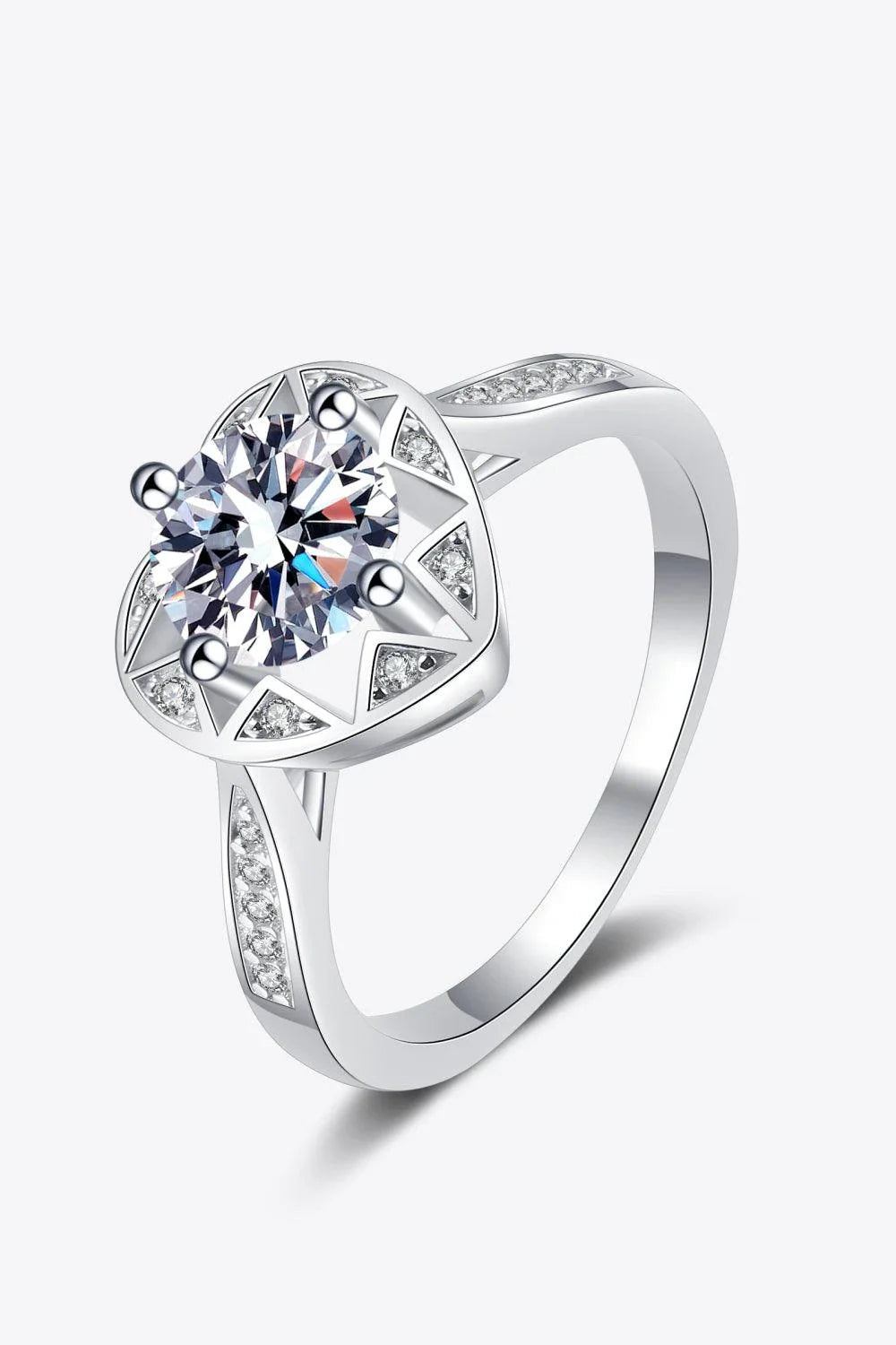 Elegant moissanite heart-shaped ring in sterling silver setting with zircon accent stones