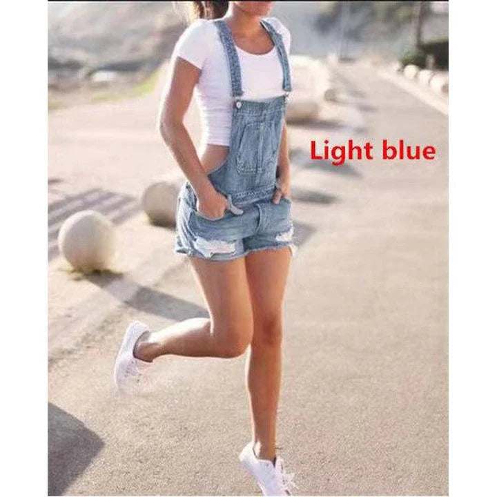 Premium British-made denim overalls shorts in classic blue hues, featuring adjustable suspenders for a tailored fit
