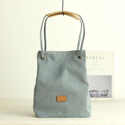 Premium canvas lattice shoulder bag in various colours, featuring a spacious design with secure zipper closure and adjustable strap for comfortable everyday carry
