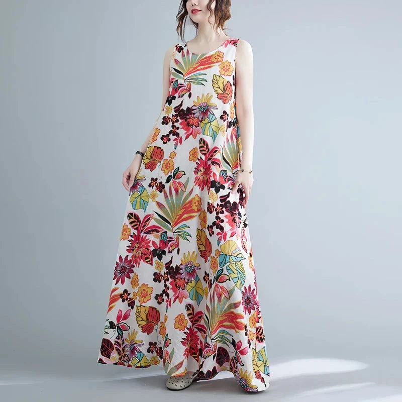 Elegant floral print cotton linen maxi dress in blue, perfect for warm weather wear