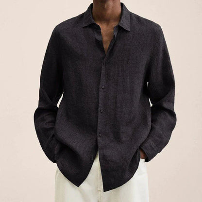Stylish men's oversized button-up cardigan shirt in a classic solid colour, featuring a relaxed fit and sophisticated lapel collar design.