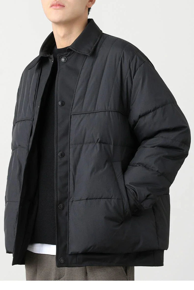 A premium lightweight down jacket in a sleek, tailored design for the stylish British gentleman