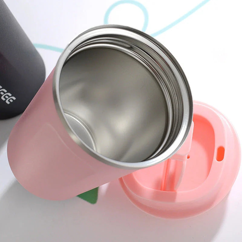 Stylish and durable stainless steel thermos mug with double-wall vacuum insulation, keeping drinks hot or cold for hours on end.