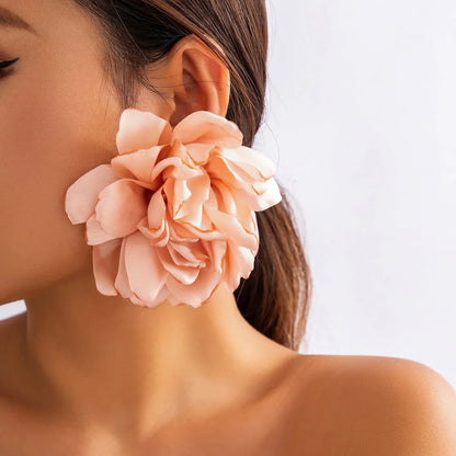 Exquisite fluffy fabric flower stud earrings in a black metal colour, featuring oversized fabric blooms for a unique and elegant design.