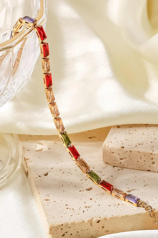 Elegant 18K gold plated bracelet with multicoloured cubic zirconia stones, a versatile accessory that adds a touch of sparkle to any outfit.