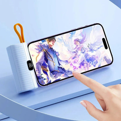 Compact, high-capacity power bank with dual charging ports and built-in cables for convenient, fast charging on the go