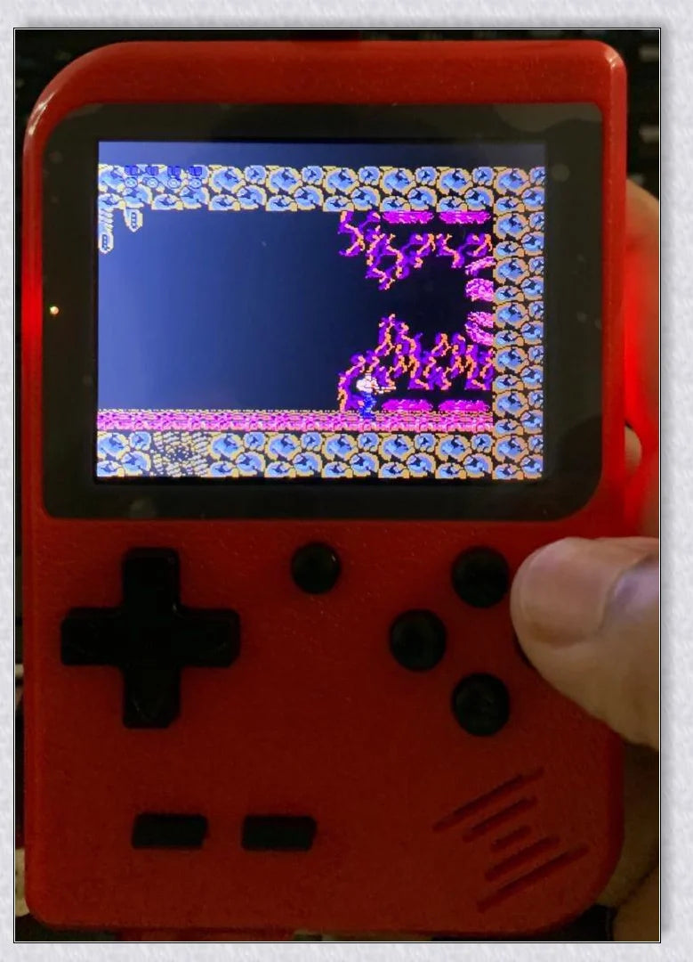 Tinytendo mini gaming console with 500 built-in retro games, compact and portable design, vibrant display, and long-lasting battery life.