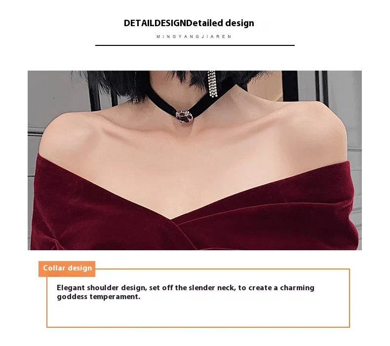 Off-shoulder wine red bridal dress with long, flowing skirt and tight waist for a sophisticated, elegant look