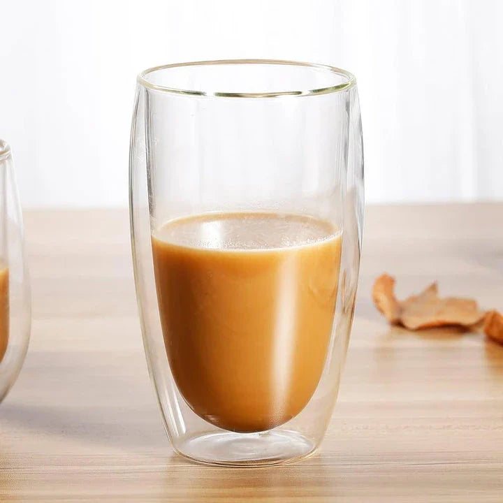 Stylish double-walled glass cup with elegant design, perfect for enjoying hot and cold drinks at the perfect temperature.