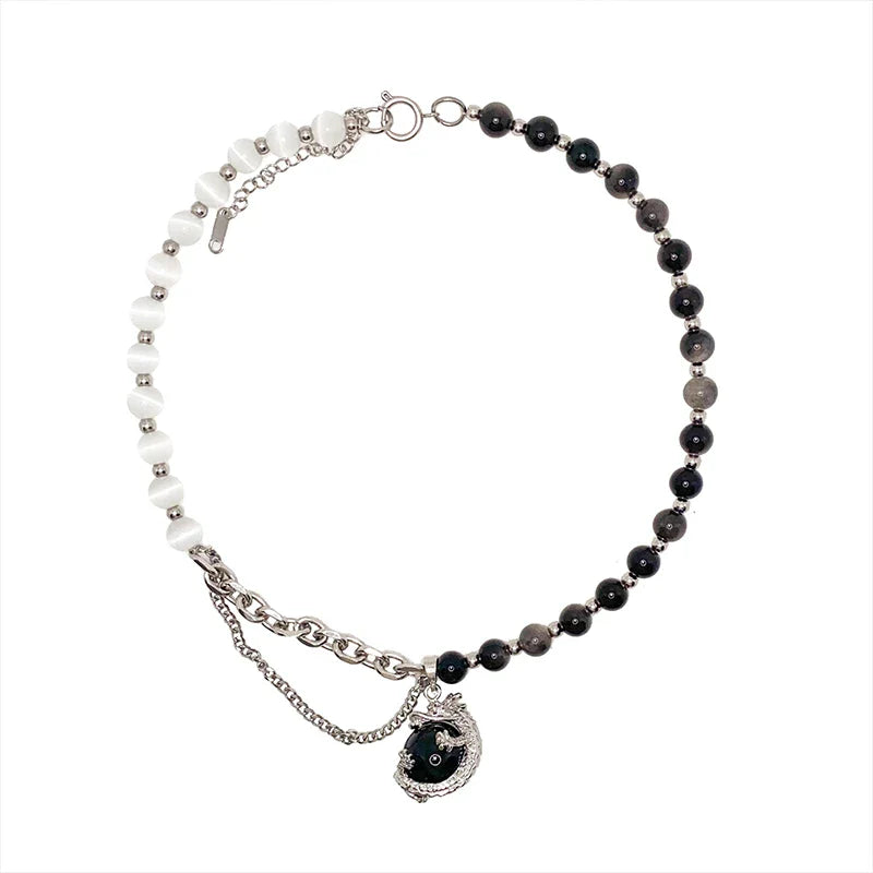 Titanium steel necklace with a black agate pendant featuring an intricate dragon design