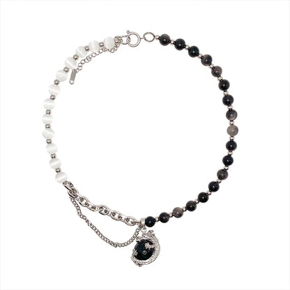 Titanium steel necklace with a black agate pendant featuring an intricate dragon design