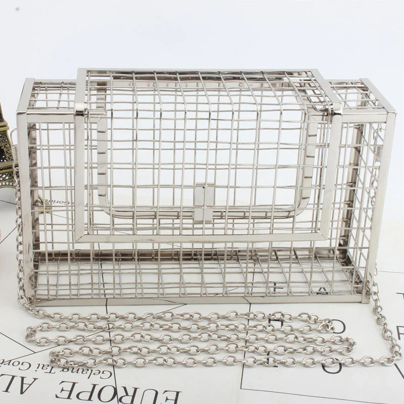 A sophisticated British-designed metal mesh clutch bag with a chain strap, available in various colours and chain styles