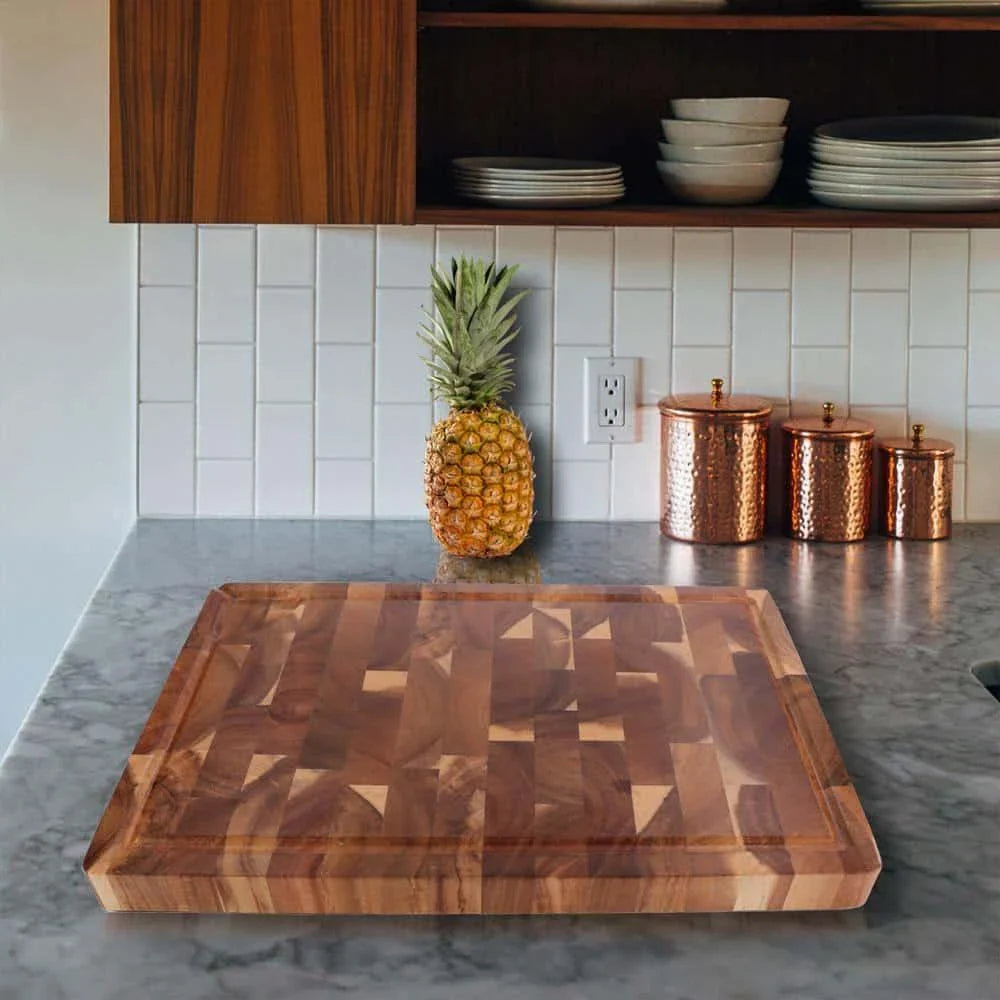 Premium Acacia wood chopping board with a convenient juice groove to catch liquids during food preparation