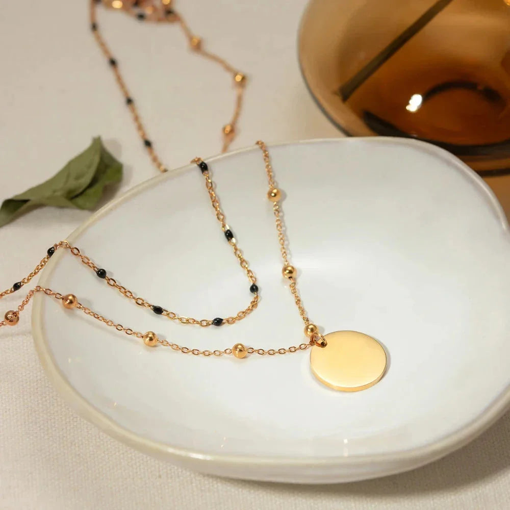 Elegant 18K gold plated black rice bead necklace, a sophisticated accessory for stylish women in the UK
