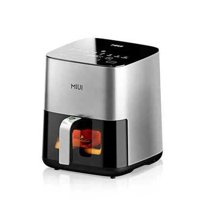 A powerful, family-sized air fryer with a touchscreen control panel and a transparent window for monitoring cooking progress.