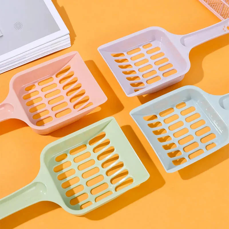 A large, high-quality cat litter scoop made of durable plastic with a hollow design for efficient cleaning.