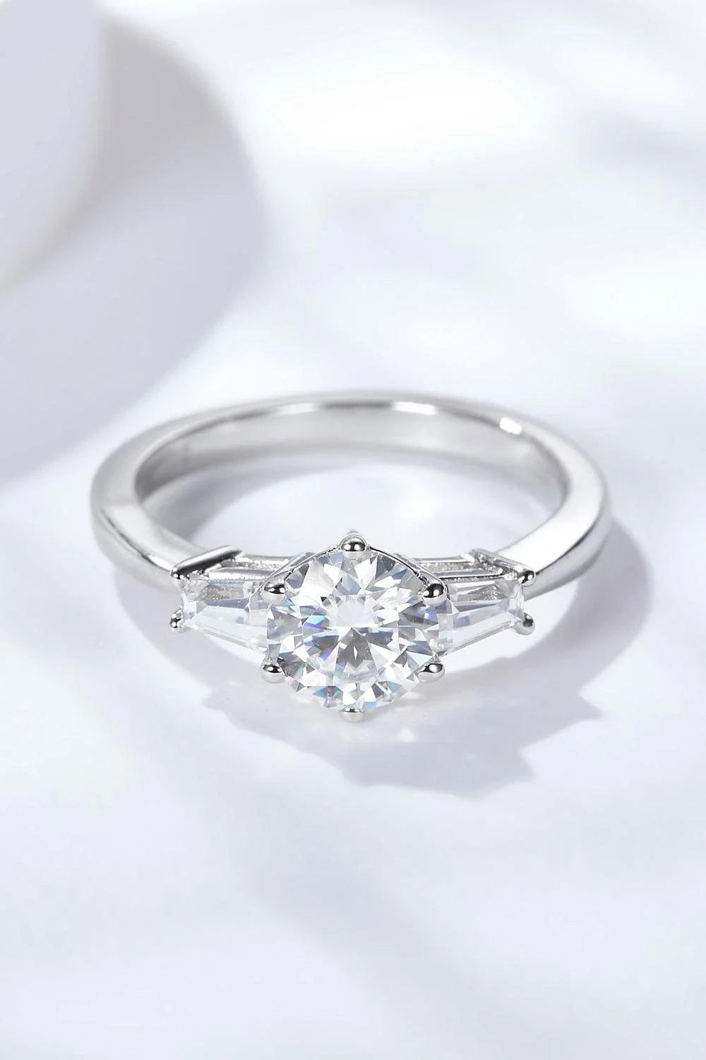 Captivating moissanite and platinum-plated ring with a sleek, minimalist design