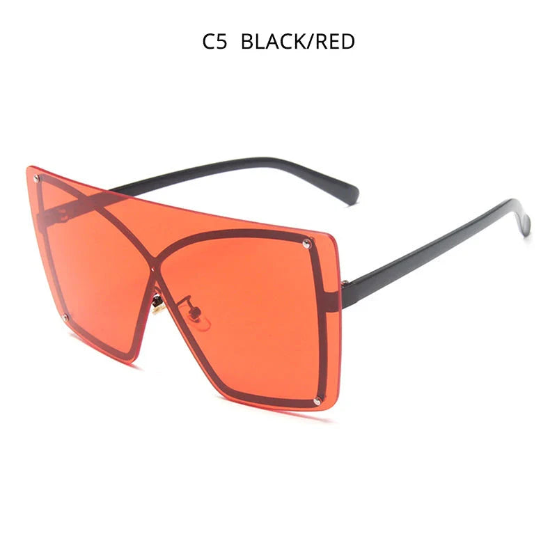 Fashionable oversized flat top sunglasses with gradient lenses and a sleek, rimless plastic frame