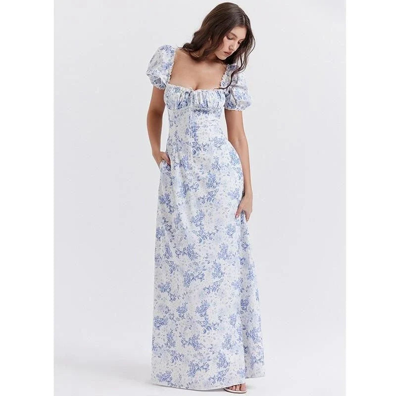 Elegant long maxi summer dress in blue with a flattering fit and flare silhouette, perfect for parties and nights out.